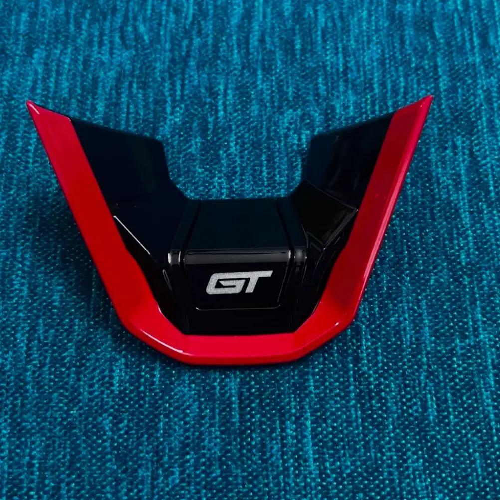 Steering gt badge available in Red colour / carbon fibre/ blue and black